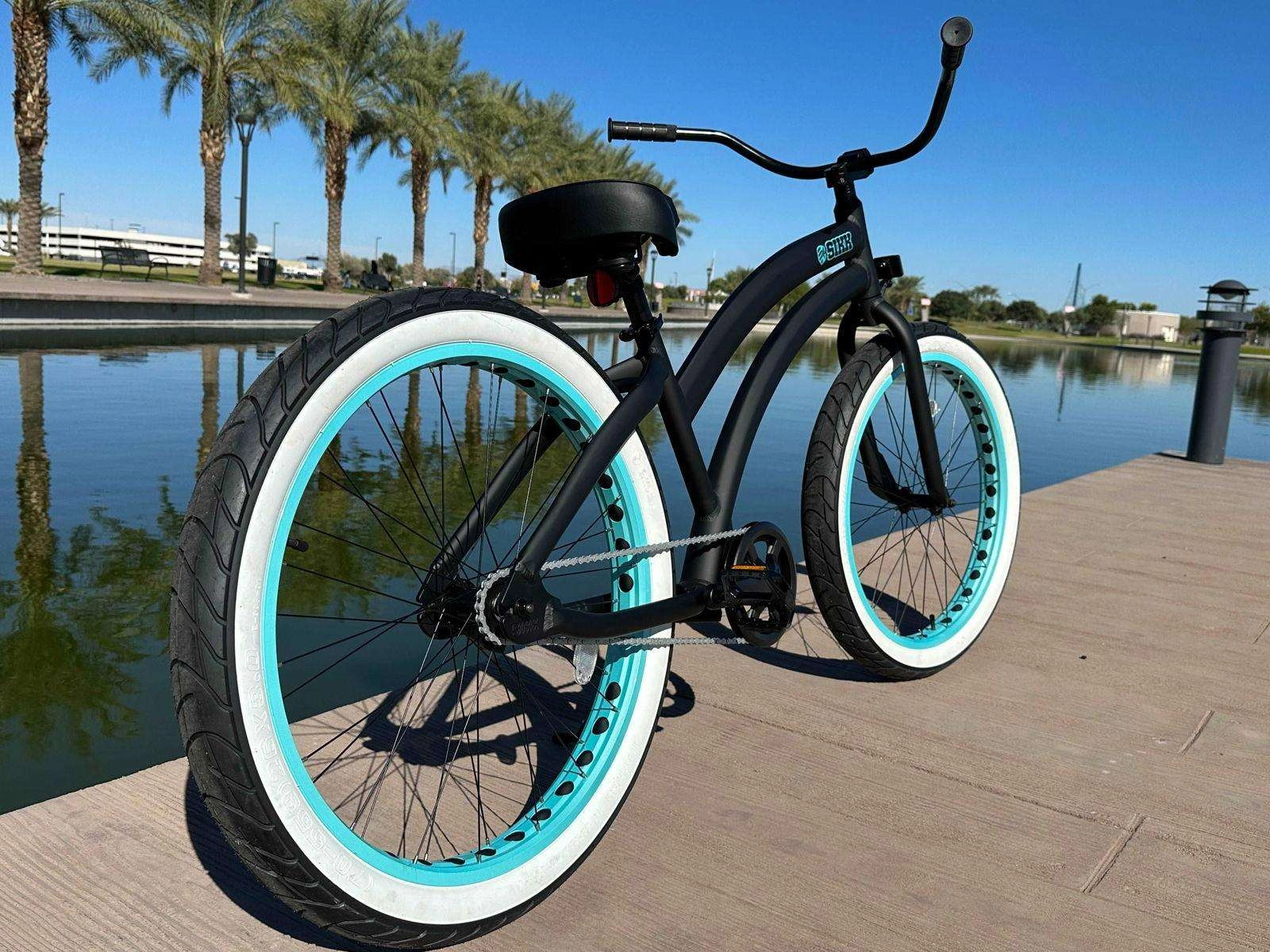 SIKK Wide Ride: Flat Black Beauty on Teal Wheels, Single Speed Fun!